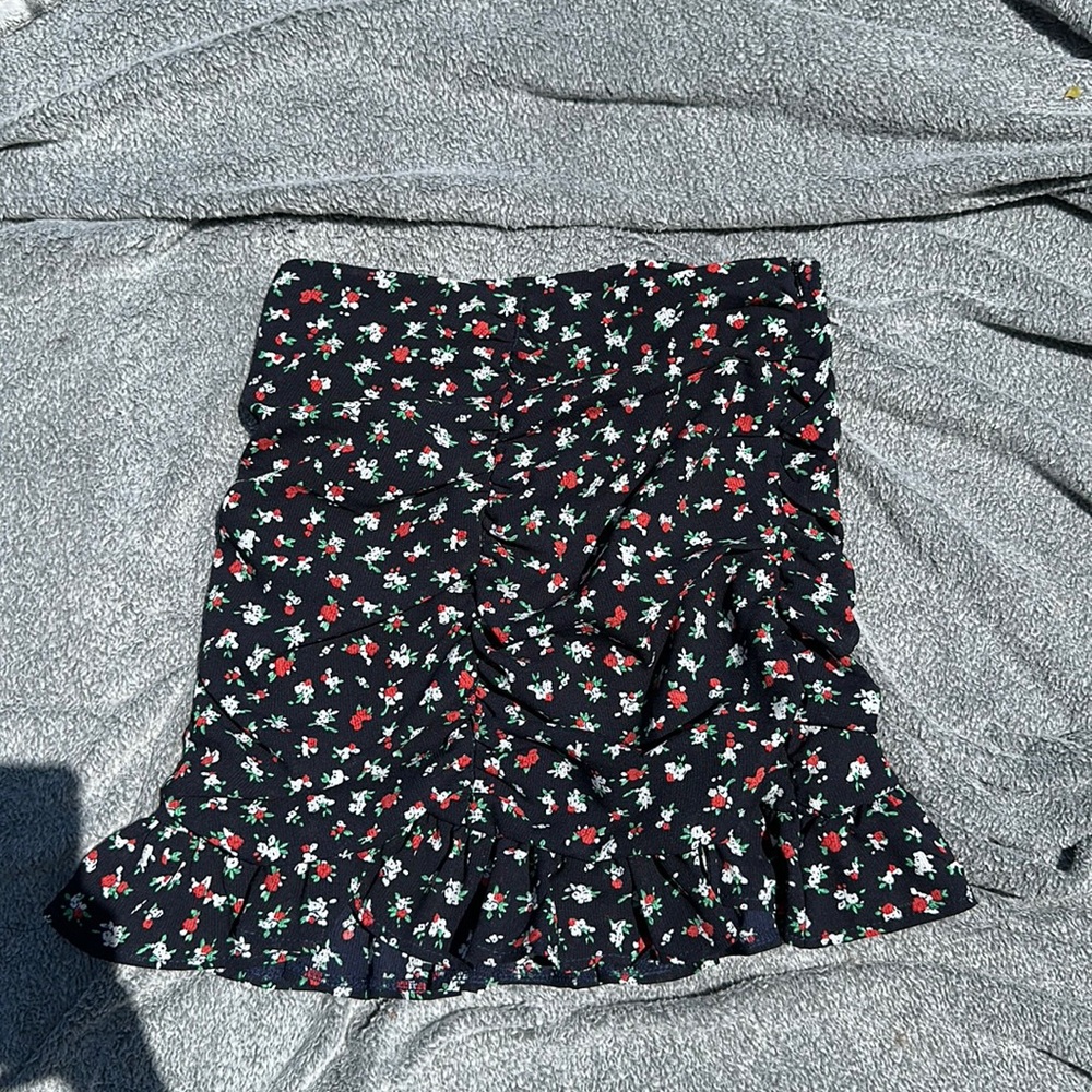 Princess Polly Mini Skirt with Flowers on it